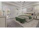 Spacious main bedroom with tray ceiling, soft carpet, and bright natural light at 970 Welch Sw St, Atlanta, GA 30310
