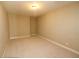 Spacious bedroom featuring neutral walls, plush carpet and a single window at 184 Cadence Trl, Canton, GA 30115
