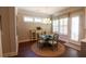 Breakfast nook with lots of natural light and quaint dining set at 184 Cadence Trl, Canton, GA 30115