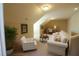 Cozy living room features neutral color palette, furniture, and natural light at 184 Cadence Trl, Canton, GA 30115