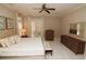Serene bedroom with neutral colors, plush carpet, and access to a private balcony at 184 Cadence Trl, Canton, GA 30115