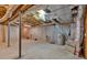 Unfinished basement area with concrete floor, exposed ductwork, and water heater at 303 Fireside Trl, Douglasville, GA 30134