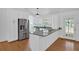 Modern kitchen with stainless steel appliances and granite countertops at 303 Fireside Trl, Douglasville, GA 30134