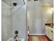 Bathroom featuring a shower/tub combo, tile surround, and vanity with marble countertops at 3304 Woolbridge Ct, Marietta, GA 30062