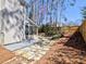Home exterior with stone walkway, deck and lush landscaped backyard at 3304 Woolbridge Ct, Marietta, GA 30062