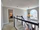 Bright foyer with staircase, chandelier, and large window, offering a welcoming entrance at 3304 Woolbridge Ct, Marietta, GA 30062