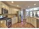 Well-equipped kitchen with stainless steel appliances and granite countertops, designed for functionality at 3304 Woolbridge Ct, Marietta, GA 30062