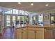 Bright kitchen featuring granite countertops, stainless steel appliances, and breakfast nook with large windows at 3304 Woolbridge Ct, Marietta, GA 30062