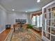 Cozy office space featuring a bay window and stylish furnishings, perfect for productivity at 3304 Woolbridge Ct, Marietta, GA 30062