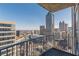High-rise condo balcony offering city views with steel railings and visible neighboring skyscrapers at 400 W Peachtree Nw St # 3412, Atlanta, GA 30308