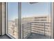 Private balcony with views of surrounding buildings at 400 W Peachtree Nw St # 3412, Atlanta, GA 30308