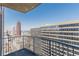 High-rise condo balcony showcasing panoramic city skyline views with metal railings at 400 W Peachtree Nw St # 3412, Atlanta, GA 30308