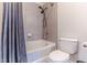 Bathroom boasts a bathtub with shower, gray tiling, and modern fixtures at 400 W Peachtree Nw St # 3412, Atlanta, GA 30308