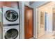 Stacked washer/dryer with access to the bathroom at 400 W Peachtree Nw St # 3412, Atlanta, GA 30308