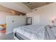 Well-lit bedroom with access to the living room at 400 W Peachtree Nw St # 3412, Atlanta, GA 30308