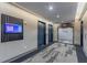Elevator bay featuring dual elevators, carpeting, and mounted display at 400 W Peachtree Nw St # 3412, Atlanta, GA 30308