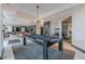 A community game room including a pool table and seating areas with a bar at 400 W Peachtree Nw St # 3412, Atlanta, GA 30308