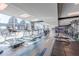 Modern gym with treadmills, ellipticals, and weight machines, offering a variety of fitness options with a great view at 400 W Peachtree Nw St # 3412, Atlanta, GA 30308