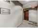 Apartment hallway with carpet flooring and unit entrances at 400 W Peachtree Nw St # 3412, Atlanta, GA 30308
