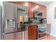 The well-equipped kitchen includes stainless steel appliances, sleek cabinets, and ample counter space at 400 W Peachtree Nw St # 3412, Atlanta, GA 30308