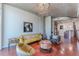 Chic living room with modern lighting fixture, hardwood floors, and contemporary furnishings at 400 W Peachtree Nw St # 3412, Atlanta, GA 30308