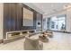 Luxury lobby area with a fireplace, modern furniture, and a sleek, contemporary design at 400 W Peachtree Nw St # 3412, Atlanta, GA 30308