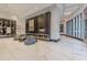 Bright lobby featuring modern décor, marble floors, and a unique accent wall, creating an inviting atmosphere at 400 W Peachtree Nw St # 3412, Atlanta, GA 30308