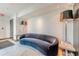 Comfortable seating area featuring a plush sofa and stylish lighting, perfect for relaxation and socializing at 400 W Peachtree Nw St # 3412, Atlanta, GA 30308