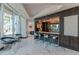 Elegant lounge with a bar, comfortable seating, and floor-to-ceiling windows offering plenty of natural light at 400 W Peachtree Nw St # 3412, Atlanta, GA 30308