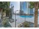 Outdoor pool with landscaping and surrounding lounge area for relaxing in an upscale urban setting at 400 W Peachtree Nw St # 3412, Atlanta, GA 30308