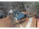 Aerial view of home in a wooded lot showing driveway at 410 Invector Ct, Locust Grove, GA 30248