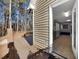 Home exterior showing a large wooden back deck with a view inside the house at 410 Invector Ct, Locust Grove, GA 30248