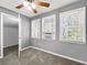Bedroom with carpet, neutral paint, natural light and a ceiling fan at 410 Invector Ct, Locust Grove, GA 30248