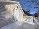 Side view of the deck, door, and siding at 410 Invector Ct, Locust Grove, GA 30248