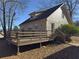 Charming home featuring a spacious deck, providing an inviting outdoor living space at 410 Invector Ct, Locust Grove, GA 30248