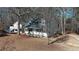 Cozy home with a guest house and well-manicured landscaping at 410 Invector Ct, Locust Grove, GA 30248
