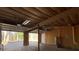 Spacious garage with a back door and hot water tank at 410 Invector Ct, Locust Grove, GA 30248