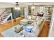 Inviting living room with a comfortable sofa and tasteful decorations at 410 Invector Ct, Locust Grove, GA 30248