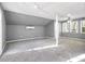 Spacious living room featuring neutral walls, carpet and natural light at 410 Invector Ct, Locust Grove, GA 30248