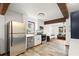 Contemporary kitchen featuring stainless steel appliances, white cabinets, and an open layout at 996 Moreland Se Ave, Atlanta, GA 30316