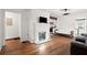 Comfortable living room with hardwood floors, fireplace, and an open layout at 996 Moreland Se Ave, Atlanta, GA 30316