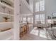 Open-concept living space seamlessly connects the kitchen, dining area, and living room, perfect for entertaining at 1351 Mckendree Park Ct, Lawrenceville, GA 30043