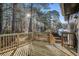 A wooden deck with ample space for outdoor gatherings and relaxation at 6615 Buckhurst Trl, Atlanta, GA 30349