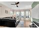 Cozy living room with a comfortable sofa and large windows providing natural light at 723 Perch Pl, Atlanta, GA 30312