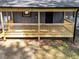 Newly constructed wooden deck, perfect for outdoor gatherings and relaxation at 8329 Marlborough Dr, Jonesboro, GA 30238