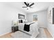 Cozy bedroom featuring natural light, neutral decor, and minimalist accents at 8329 Marlborough Dr, Jonesboro, GA 30238