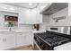 Modern kitchen with updated stainless steel appliances and stylish countertops at 8329 Marlborough Dr, Jonesboro, GA 30238