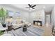 Modern living room with a cozy seating area and stylish accents and light wood floor at 8329 Marlborough Dr, Jonesboro, GA 30238