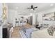 Open concept featuring view of the kitchen, living room and dining space with hardwood floors at 8329 Marlborough Dr, Jonesboro, GA 30238