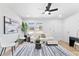 Bright and airy living room area with light walls, hardwood floors, and nice natural lighting at 8329 Marlborough Dr, Jonesboro, GA 30238